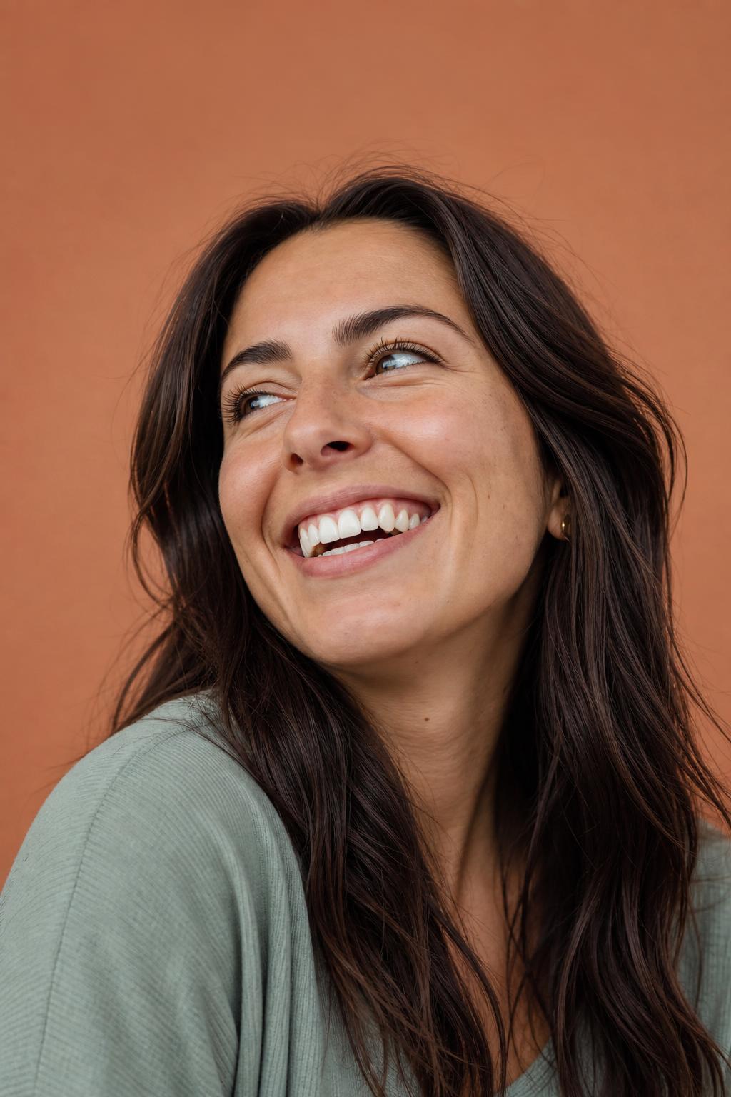 Happy Bright White patient with a confident bright smile after teeth whitening